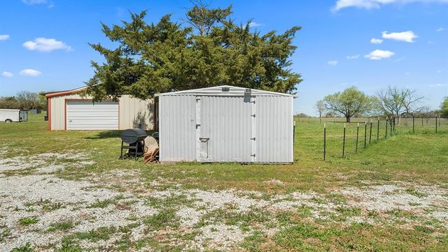 View of outbuilding with an outdoor structure and fence | Image 9