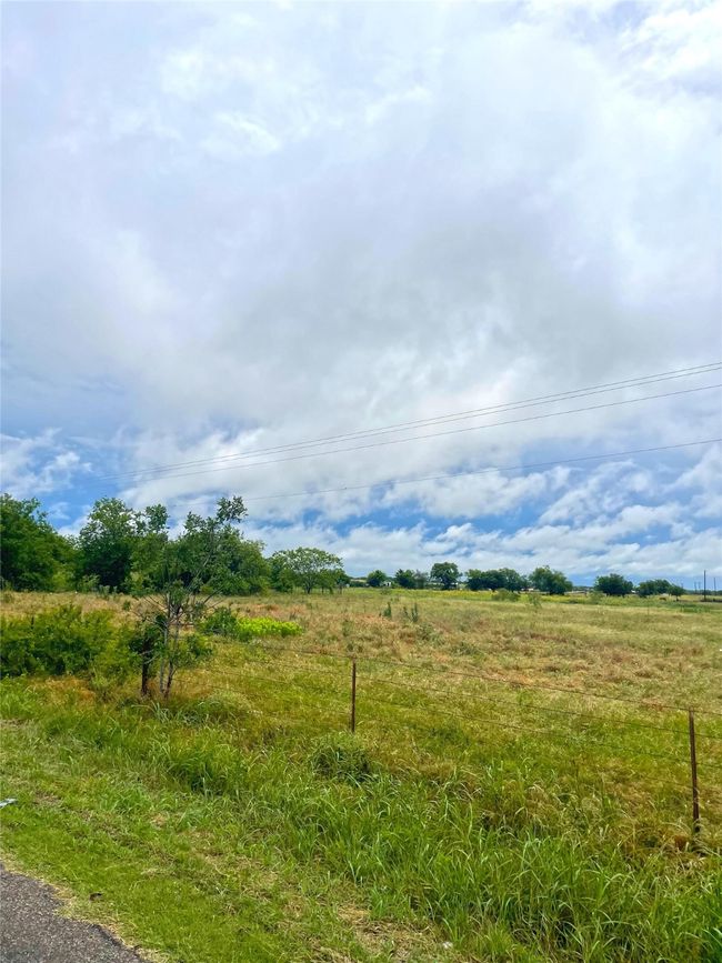 View of yard featuring a view of countryside | Image 5