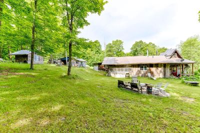 Nice firepit area along with space for outdoor dining and games | Image 3