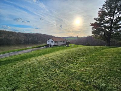 View of yard at dusk | Image 3