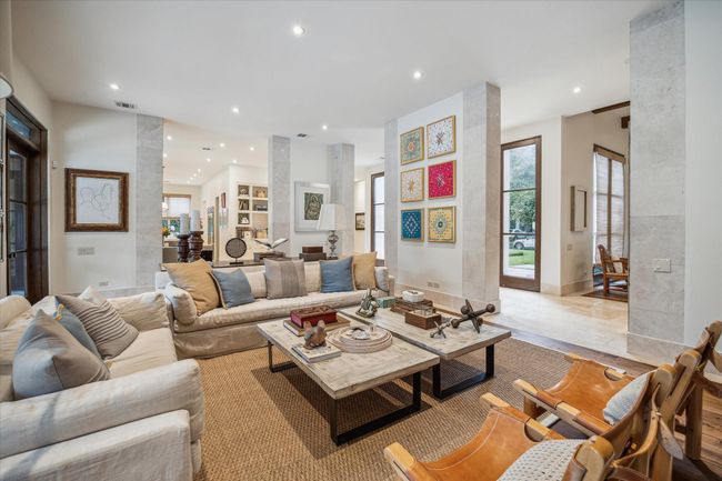 The floor plan is open. You will enjoy the flow rom one luxurious space to the next. This is a great family home that entertains beautifully. | Image 16