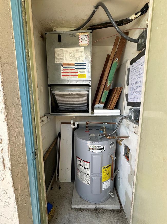Water Heater and A/C ouside closet | Image 35