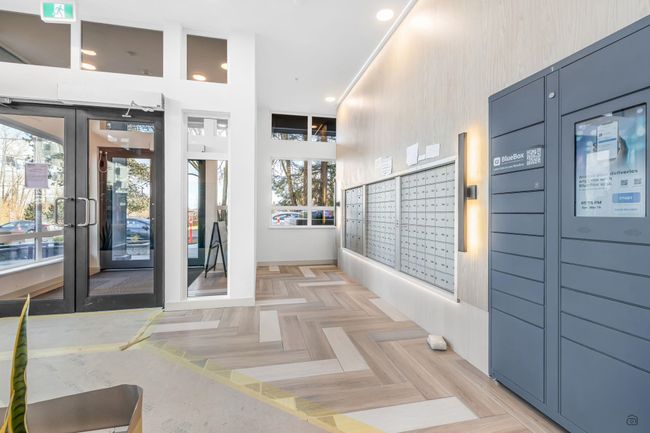Interior space featuring mail area | Image 26