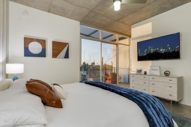Bedroom featuring access to outside and ceiling fan | Image 24