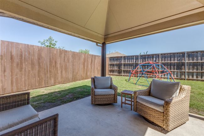 Covered patio for outdoor entertaining. | Image 23