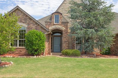 View of front facade with a front yard | Image 2