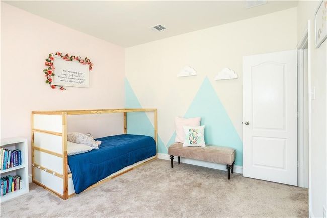 Carpeted bedroom with baseboards | Image 22
