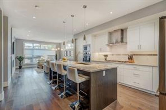 4004 2 St Nw, Home with 4 bedrooms, 3 bathrooms and 2 parking in Calgary AB | Image 4