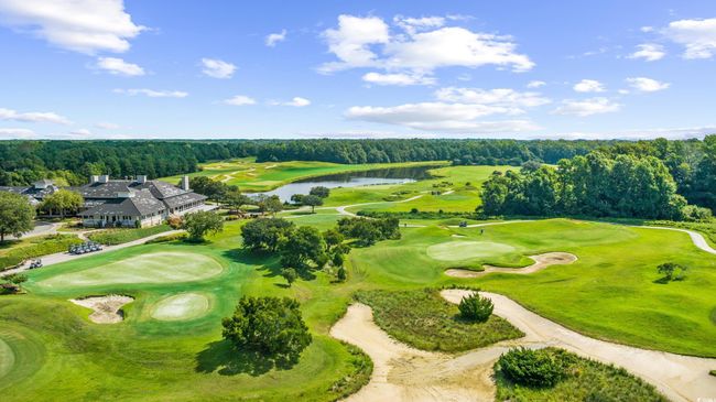Drone / aerial view of a large body of water and a local golf course | Image 33