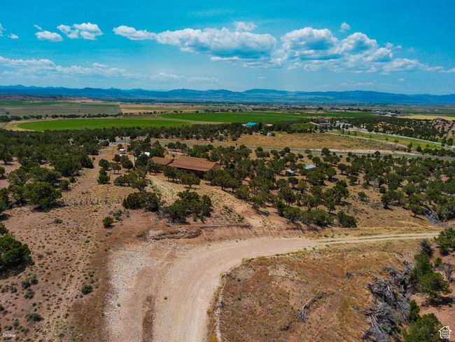 Overview of rural landscape featuring a mountain backdrop | Image 50