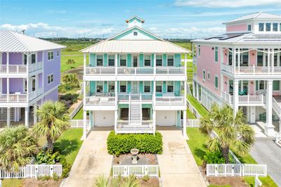 Beautiful 2nd row beach house with double driveway and two balconies facing the Gulf | Image 1