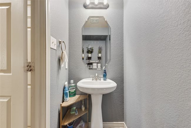 Bathroom with a textured wall | Image 19