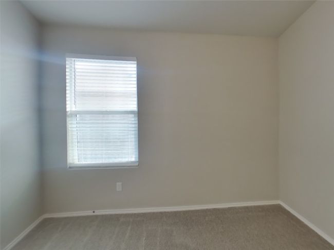Spare room with carpet flooring and plenty of natural light | Image 9