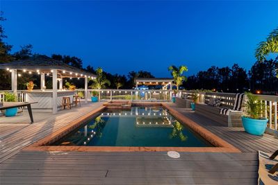 Night time ambiance by the pool! | Image 3