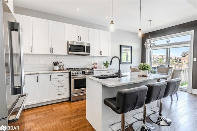 23 Curtis Way, House other with 4 bedrooms, 3 bathrooms and 4 parking in Springwater ON | Image 4