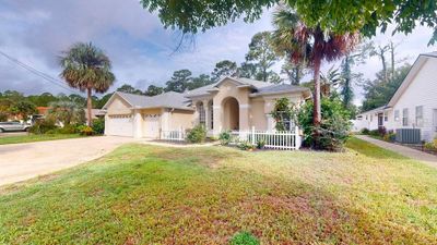 39 Woodhollow Lane, House other with 4 bedrooms, 3 bathrooms and null parking in Palm Coast FL | Image 1