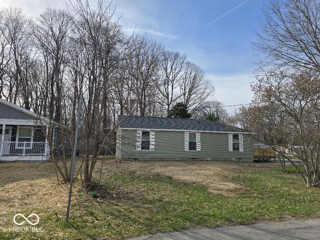 view of home's exterior featuring crawl space | Image 11