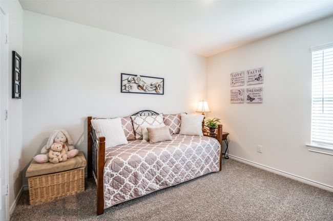Bedroom featuring carpet and baseboards | Image 17