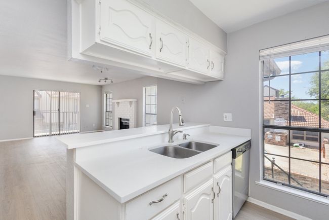 Kitchen overlooks living room | Image 11