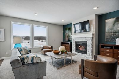 (*Photo of decorated model, actual homes finishes will vary) Gas fireplace is a must have during Minnesota's long winters. | Image 3