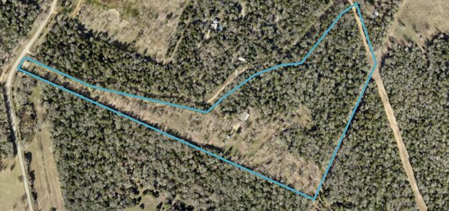 Aerial overview of property's location with property parcel outlined | Image 19
