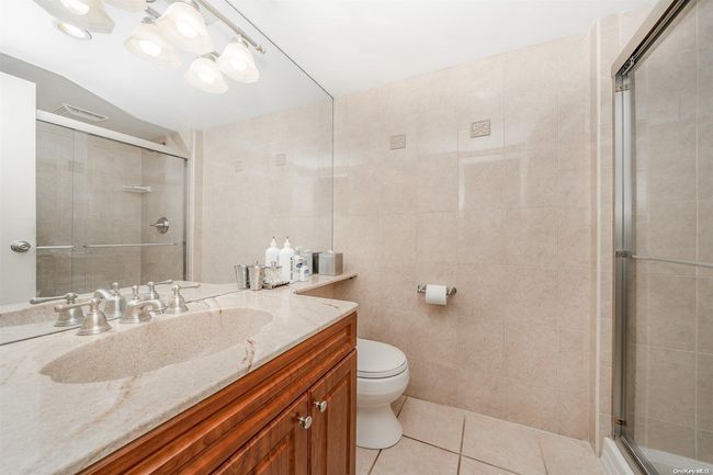 93 - 93 Southgate Cir, Condo with 3 bedrooms, 2 bathrooms and null parking in Massapequa Park NY | Image 5