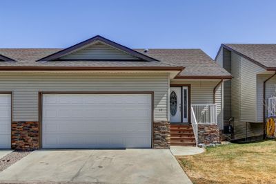 17 Garden Way, Home with 2 bedrooms, 2 bathrooms and 2 parking in Drumheller AB | Image 1