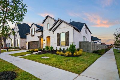 French country inspired facade with a yard | Image 2