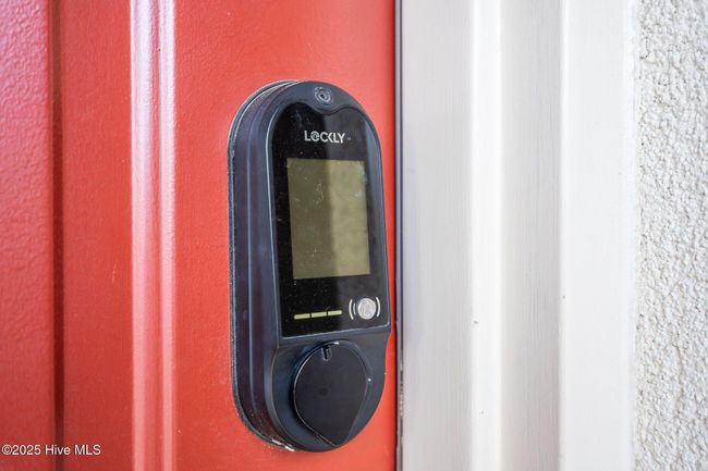 Lockly Smart Lock on Front Door: Can open with an Access code or a Key | Image 7