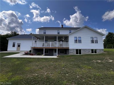 Rear view of house featuring a yard | Image 1