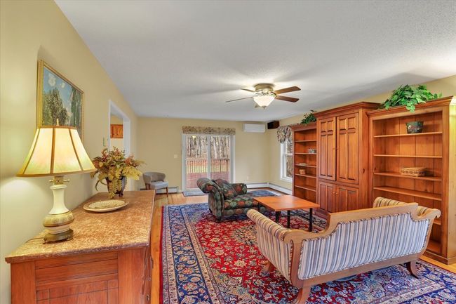 Front to back living room with sliding door to rear deck | Image 9