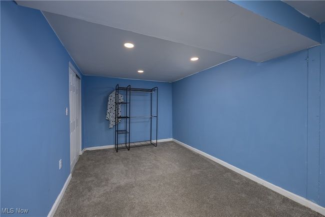 Carpeted empty room featuring recessed lighting and baseboards | Image 16