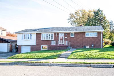 Solid brick ranch home features 3 bedrooms and 2 full bathrooms and a fist floor family room located on a cul-de-sac street. | Image 1