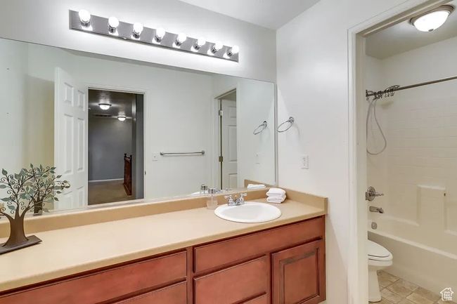 Full bathroom with tub / shower combination, toilet, and vanity | Image 24