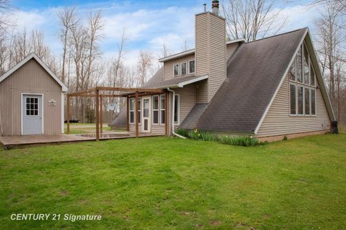 1180 Winding Wood Drive, Grant Township, MI, 48622 | Card Image