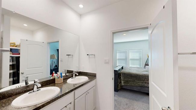 Vanity viewed from the primary bedroom closet | Image 28