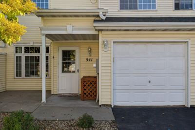 Entry with adjacent patio is perfect for enjoying the changing fall leaves. | Image 2