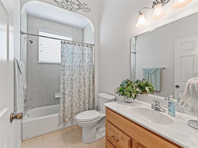 Guest bathroom w/Tiled Tub & Shower combination | Image 24