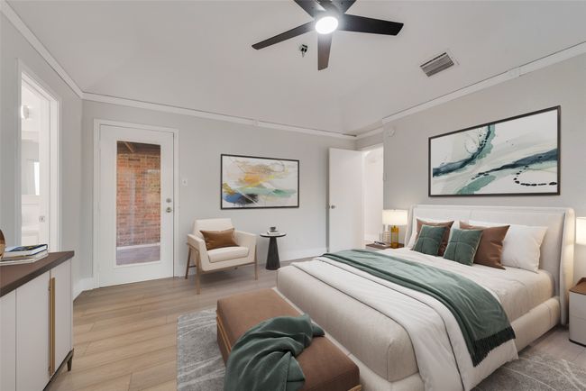 Bedroom with light wood-style floors, access to exterior, a ceiling fan, and ornamental molding | Image 11