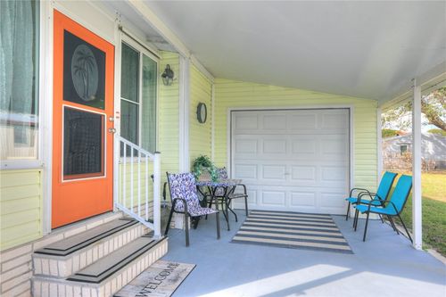 711 Amaryllis Dr, Barefoot Bay, FL, 32976-7181 | Card Image