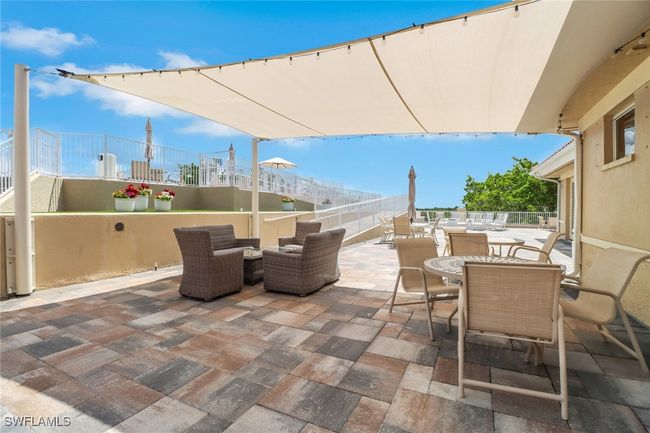View of patio with outdoor dining space | Image 18