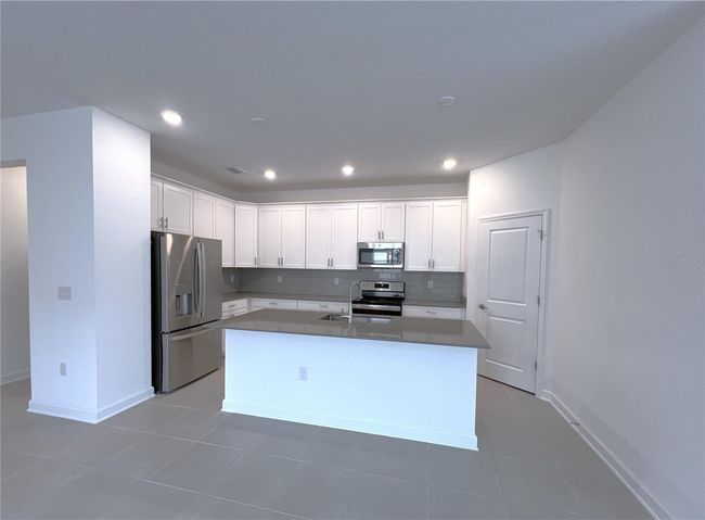 4048 Redbridge Loop, House other with 4 bedrooms, 3 bathrooms and null parking in DAVENPORT FL | Image 8