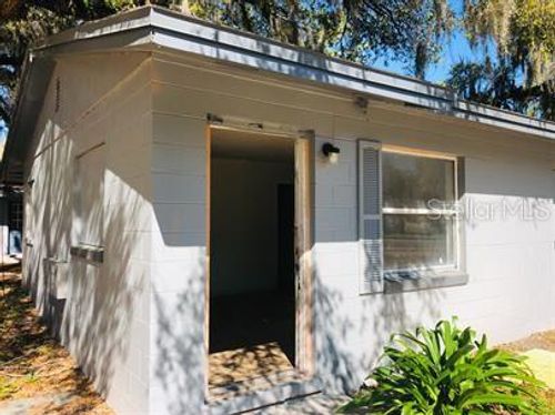 411 Kilgore St, Wildwood, FL, 34785-3937 | Card Image