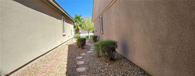 View of home's exterior with stucco siding | Image 8
