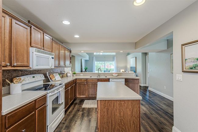 The kitchen is connected to the family room | Image 44