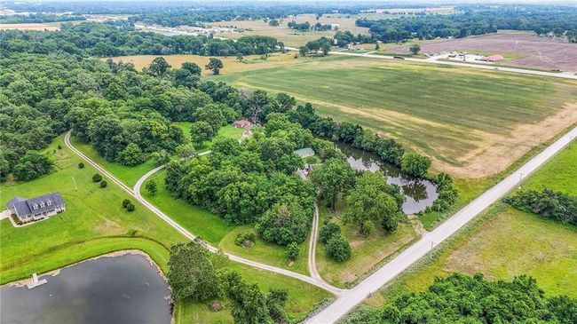 Aerial view of sparsely populated area featuring a large body of water | Image 84
