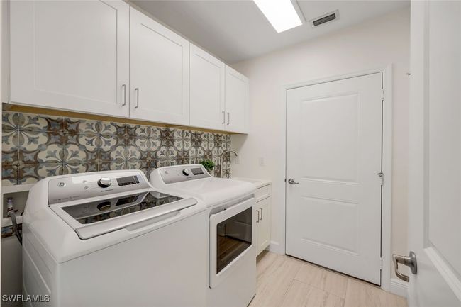 Laundry Room with Utility Tub | Image 18