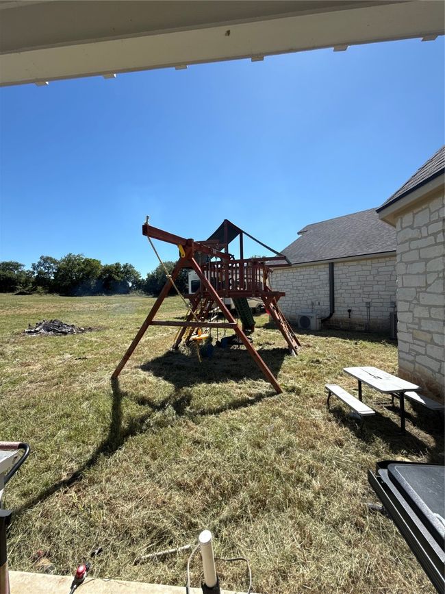 View of play area with a yard | Image 29