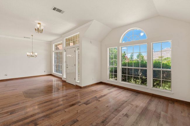 Open concept, tall ceilings & wood floors | Image 4
