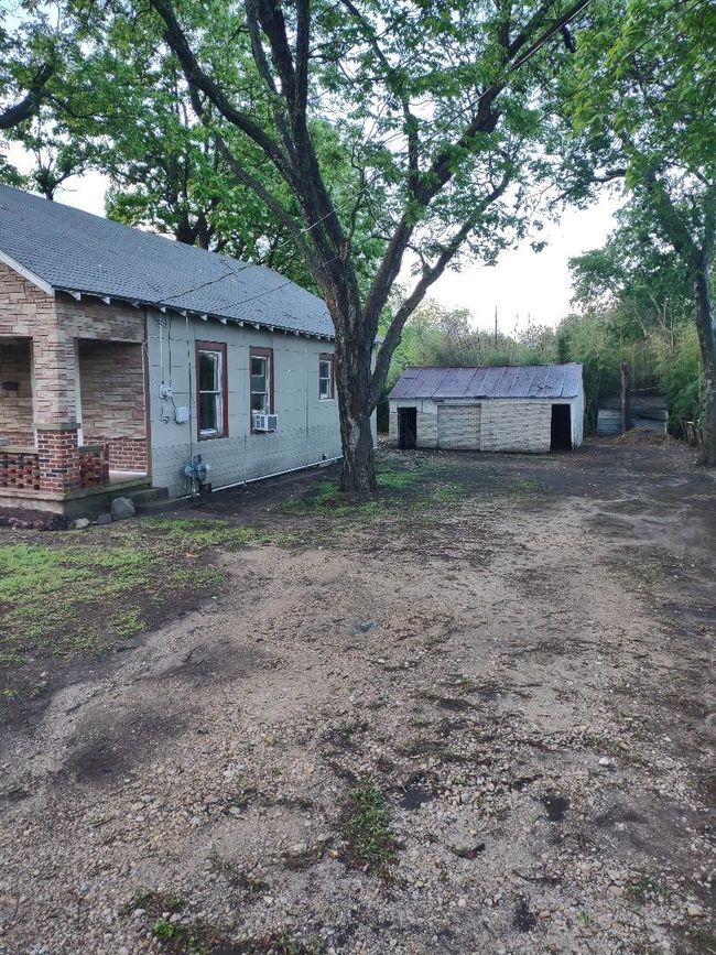 View of yard featuring an outdoor structure | Image 28